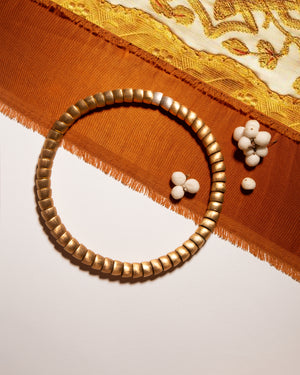Dome-shaped bronze necklace with silver clasp