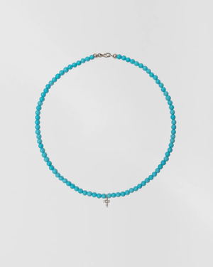 Turquoise choker w. big diamond cross