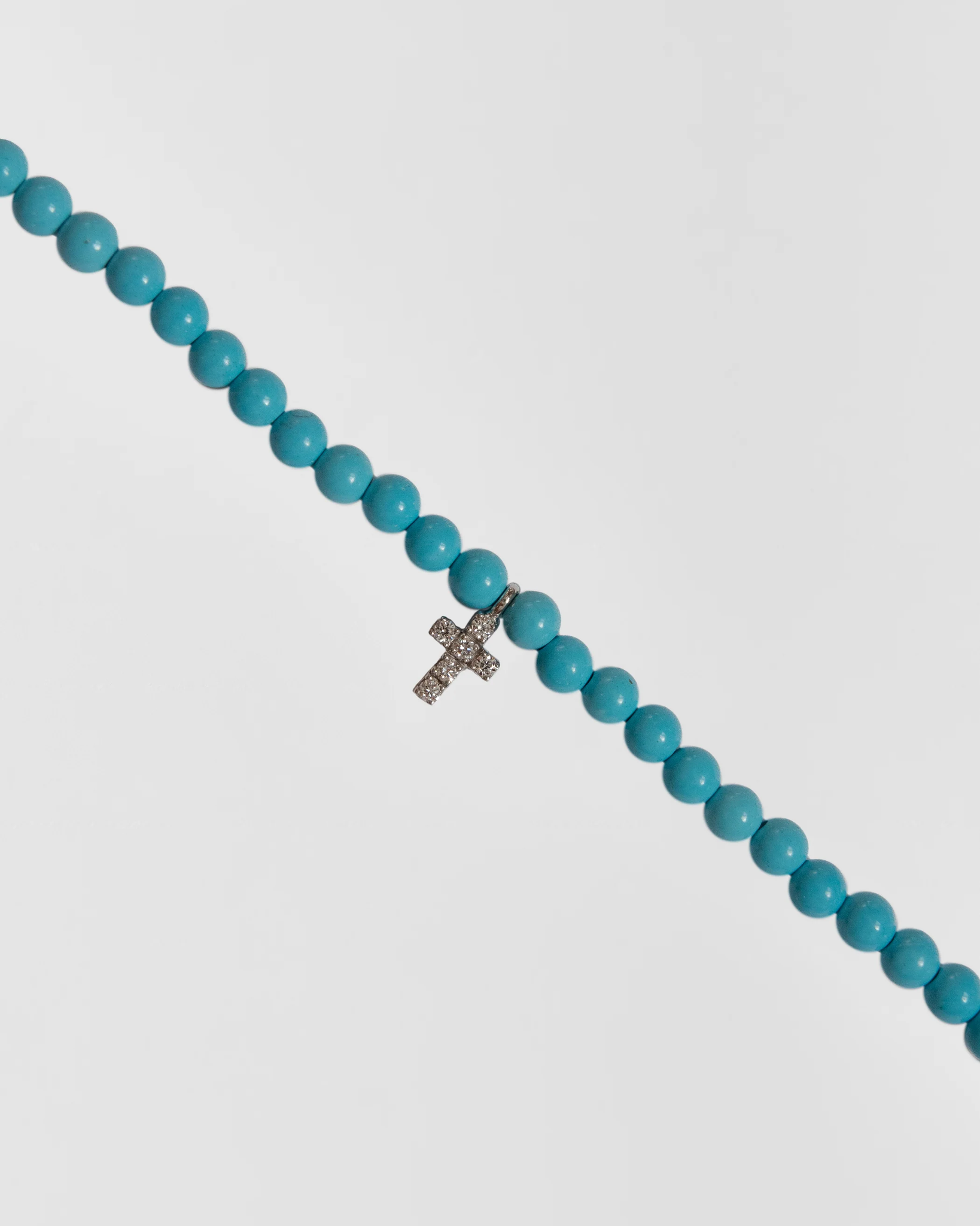 Turquoise choker w. big diamond cross