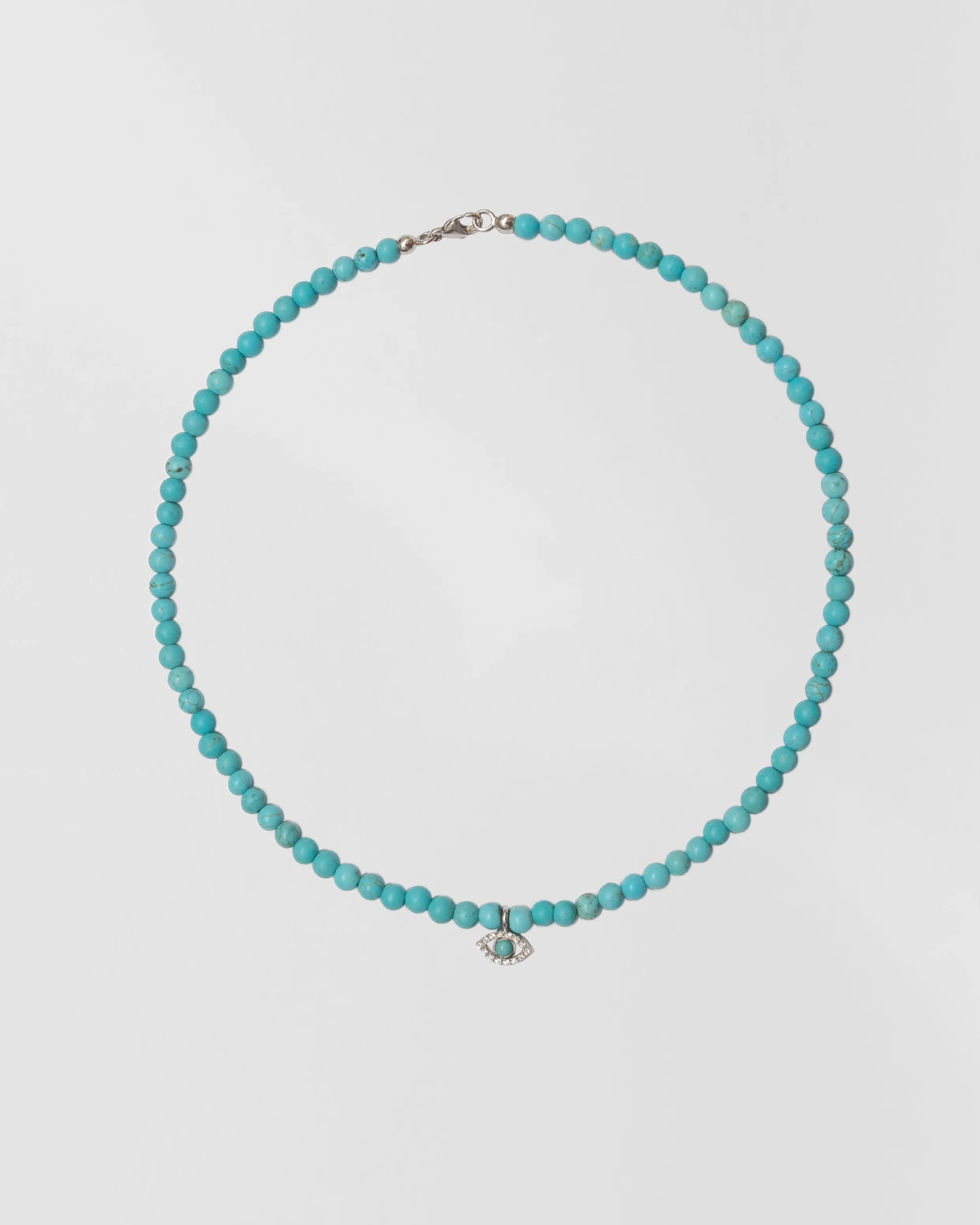 Turquoise choker w. diamond evil eye