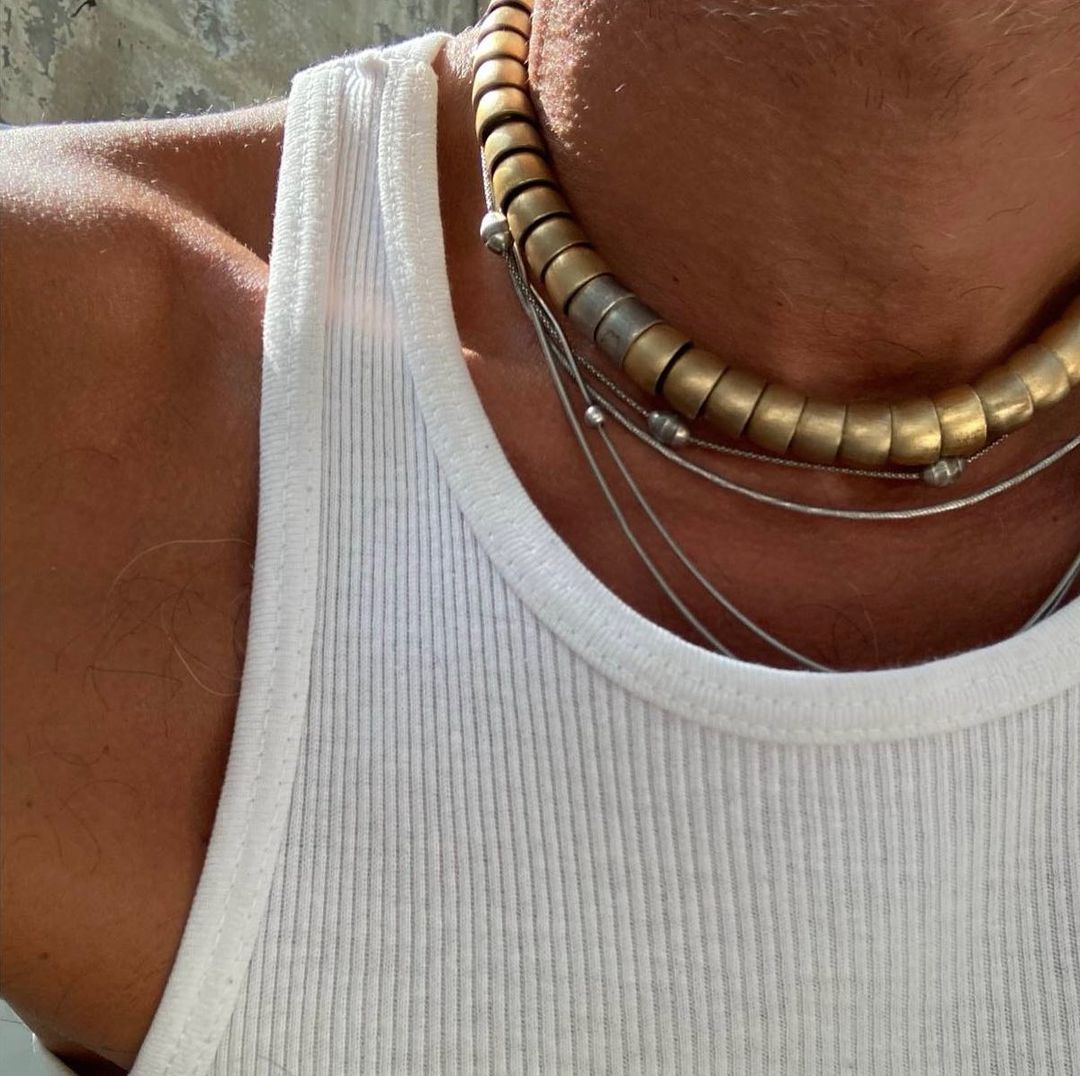 Dome-shaped bronze necklace with silver clasp