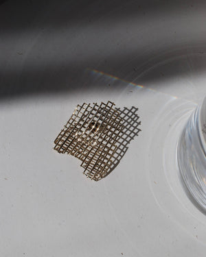 Small grid mono earring