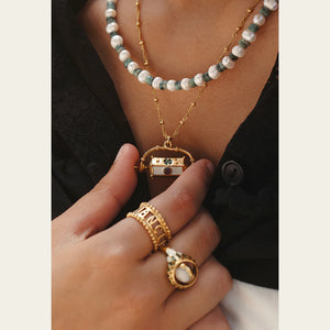 Sacha Talisman Roll Necklace