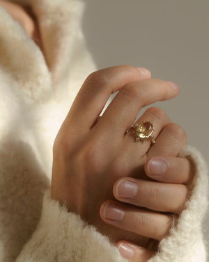 Ring with yellow beryl and diamonds